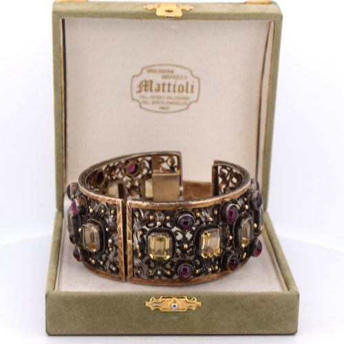 Bracelet Bracelet Buccellati vintage en or jaune 18 carats orné de béryls et de grenats 58 Facettes