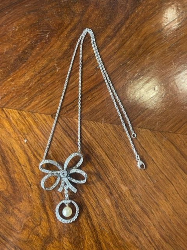 Collier Collier noeud, diamants et perles, fin XIXéme 58 Facettes