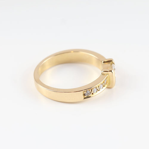 Bague 55 Bague solitaire en or jaune 18 carats avec diamant central et diamants latéraux 58 Facettes 131645