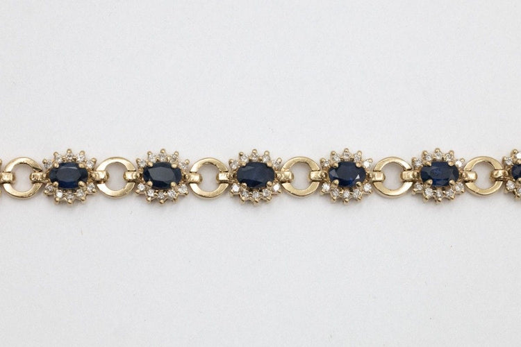 Bracelet Bracelet exclusif en or jaune 14k avec saphirs et diamants 58 Facettes 11393