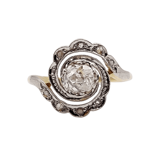 Bague 43 Bague tourbillon antique en or 18k et platine, diamant ancien 0,30 ct et roses 58 Facettes A06352