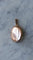 Pendentif Pendentif médaillon ouvrant cabochon grenat et perles fines en or rose 18k 58 Facettes