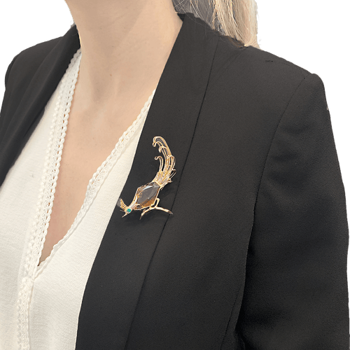 Broche Broche vintage Oiseau de Paradis en or rose avec citrine et émeraude 58 Facettes 34097