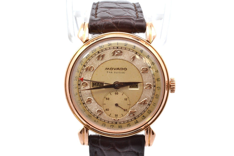 Montre Movado Triple Calendar - Montre en or 18k 58 Facettes 26888