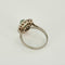 Bague 51 Bague marguerite en or blanc et or jaune 18K, émeraude 1 ct et diamants 58 Facettes 58FC145