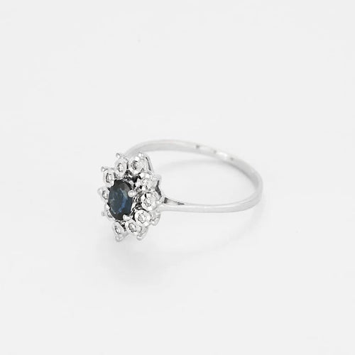 Bague 60.5 Bague marguerite en or blanc 18 carats, saphir 0,45 ct et diamants 58 Facettes 58FC103