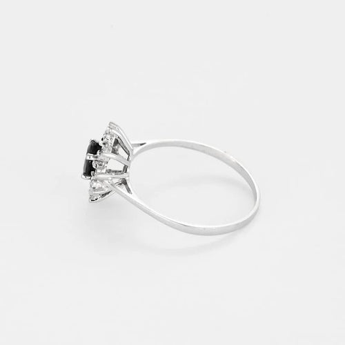 Bague 60.5 Bague marguerite en or blanc 18 carats, saphir 0,45 ct et diamants 58 Facettes 58FC103