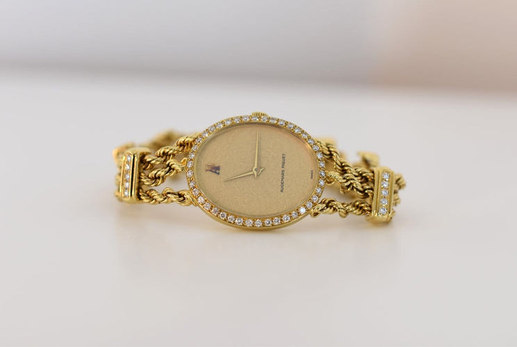 Montre Audemars Piguet Lady Classique DA - Montre joaillière en or jaune 18K et diamants 58 Facettes AUP-100