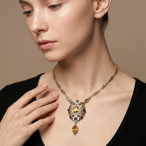 Collier Sautoir - Collier en or jaune émaillé et saphirs jaunes 58 Facettes OC-63500317