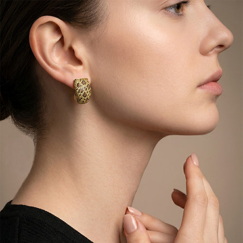 Boucles d'oreilles Boucles d’oreilles clips panthère en or jaune 18 carats, saphirs jaunes et diamants 58 Facettes 66000222