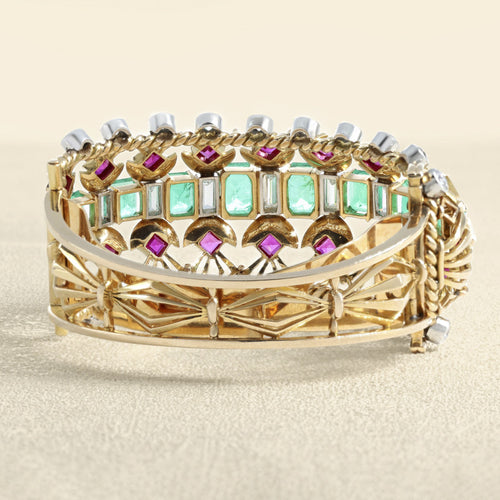 Bracelet Bracelet rétro 1940 en or jaune 18 carats, émeraudes, diamants et rubis 58 Facettes 62800060