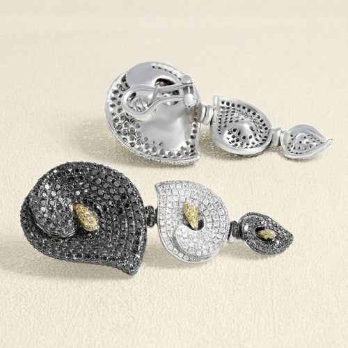 boucles-d-oreilles-or-blanc-et-diamants.jpg