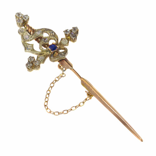 Broche Broche épée vintage en or rouge 18k, argent, diamants et saphir 58 Facettes 21309-0733