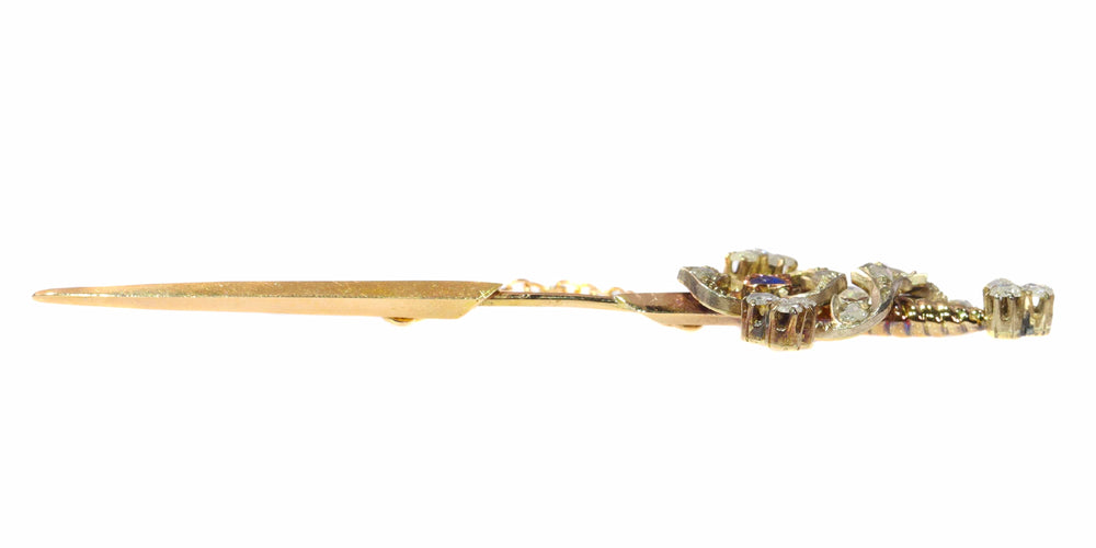 Broche Broche épée vintage en or rouge 18k, argent, diamants et saphir 58 Facettes 21309-0733