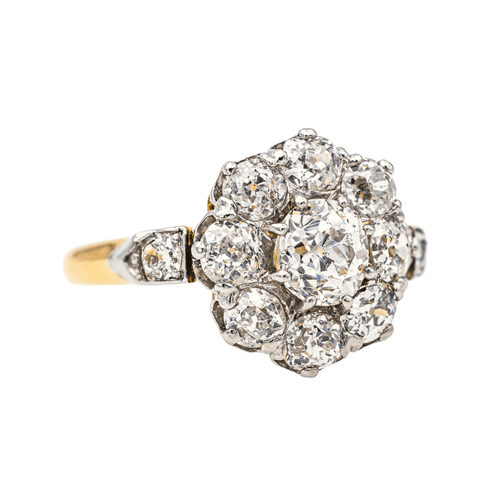 Bague Bague marguerite en or jaune et platine sertie de diamants 58 Facettes 3358946CN