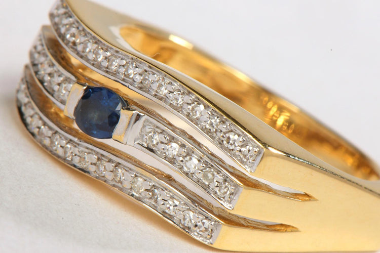 Bague 58 Bague en or jaune 18 carats avec saphir ovale et diamants 58 Facettes 00390CN