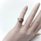 Bague Bague boucle rétro en or rose 14K avec diamants et rubis 58 Facettes