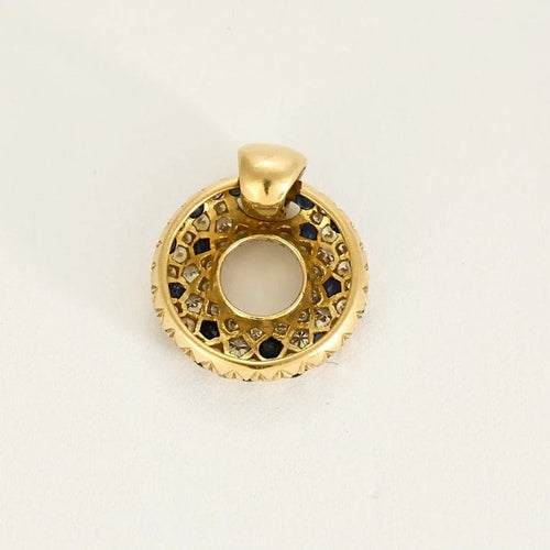 Pendentif Pendentif rond ajouré en or jaune 18K, diamants et saphirs 58 Facettes CRE0100X12