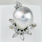 Bague 55.5 Bague en or blanc avec perle baroque et diamants 58 Facettes 1855
