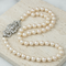Broche Art déco - Broche en or blanc diamants et perles 58 Facettes 2151