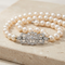 Broche Art déco - Broche en or blanc diamants et perles 58 Facettes 2151