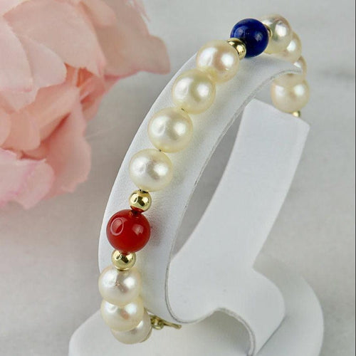 Bracelet Armband en perles, or 14 carats et pierres fines 58 Facettes 2306