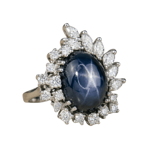 Bague 53.5 Bague en or blanc 750, saphir étoilé cabochon et diamants 58 Facettes 1864