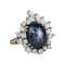 Bague 53.5 Bague en or blanc 750, saphir étoilé cabochon et diamants 58 Facettes 1864