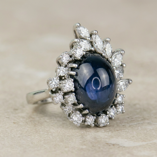 Bague 53.5 Bague en or blanc 750 avec saphir étoilé et diamants 58 Facettes 1864