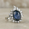 Bague 53.5 Bague en or blanc 750 avec saphir étoilé et diamants 58 Facettes 1864