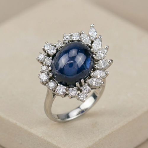 Bague 53.5 Bague en or blanc 750 avec saphir étoilé et diamants 58 Facettes 1864