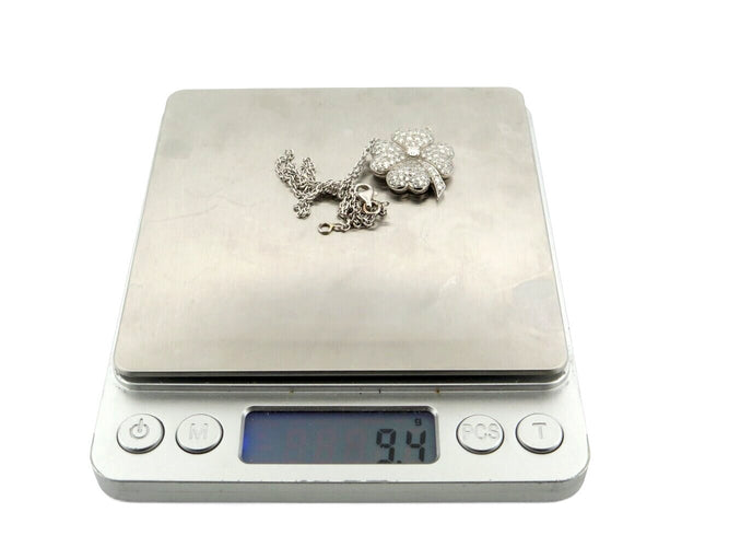 Collier Collier pendentif fleur camélia en or blanc 18k et diamants 1,63 ct 58 Facettes 270129