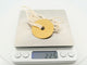 Collier Dinh Van - Collier pendentif Pi 40 mm en or jaune 24k martelé 58 Facettes 271154