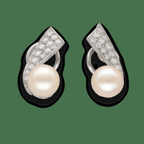 Boucles d'oreilles Boucles d’oreilles clips vintage vers 1970 en or gris 18k, diamants et perles 58 Facettes FB10953
