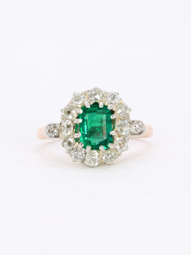 Bague 53 Bague marguerite ancienne en or rose et blanc 18 carats, émeraude et diamants 58 Facettes 1108.11