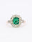 Bague 53 Bague marguerite ancienne en or rose et blanc 18 carats, émeraude et diamants 58 Facettes 1108.11