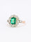 Bague 53 Bague marguerite ancienne en or rose et blanc 18 carats, émeraude et diamants 58 Facettes 1108.11
