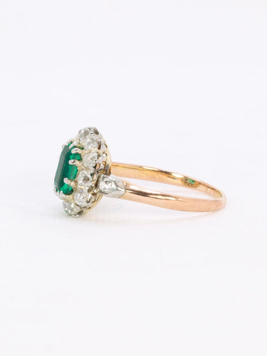 Bague 53 Bague marguerite ancienne en or rose et blanc 18 carats, émeraude et diamants 58 Facettes 1108.11
