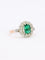Bague 53 Bague marguerite ancienne en or rose et blanc 18 carats, émeraude et diamants 58 Facettes 1108.11