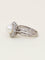 Bague 50 Bague marguerite vintage en or blanc 18 carats avec perle et diamants 58 Facettes 1186.3