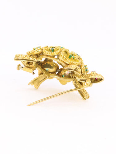 Broche Broche tortue en or jaune 18 carats, émeraudes et rubis 58 Facettes 1170.2