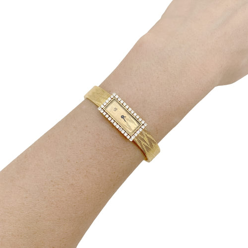 Montre UTI - Montre vintage en or jaune 750/000 et diamants 58 Facettes 34991