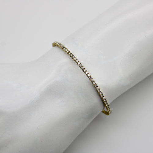 Bracelet Bracelet jonc flexible en or 14 carats et diamants 58 Facettes A2002R