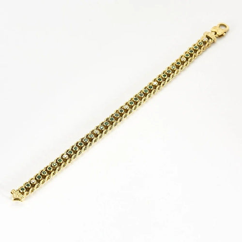 Bracelet Elegant Bracelet en or jaune, diamants et émeraudes 58 Facettes B250662