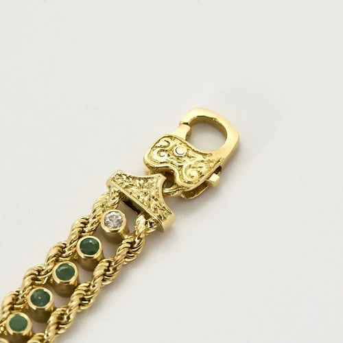 Bracelet Elegant Bracelet en or jaune, diamants et émeraudes 58 Facettes B250662