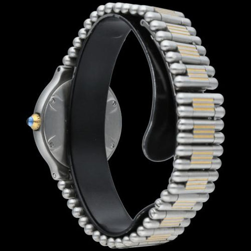 Montre Cartier Must 21 - Montre femme quartz en or jaune et acier 58 Facettes MT42270