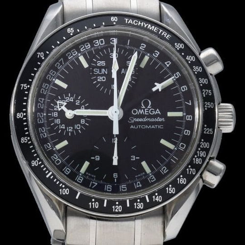 Montre Omega Speedmaster - Montre chronographe Day-Date en acier 58 Facettes MT45135