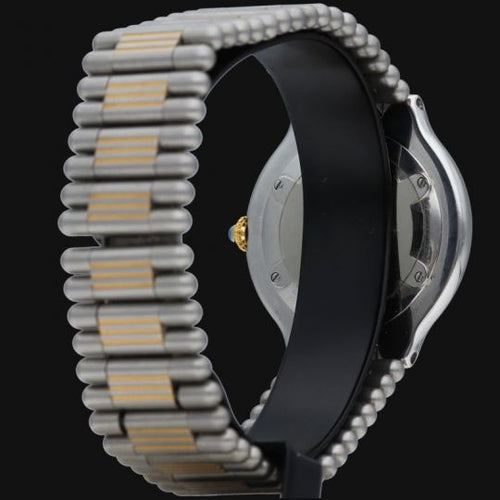 Montre Cartier Must 21 - Montre femme quartz en or jaune et acier 58 Facettes MT44972
