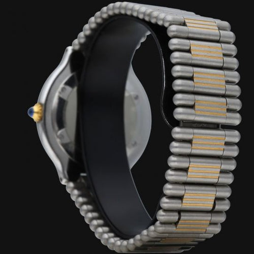 Montre Cartier Must 21 - Montre femme quartz en or jaune et acier 58 Facettes MT44972