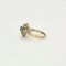 Bague 55 Bague motif floral en platine et or gris avec diamants et émeraude 58 Facettes 240356